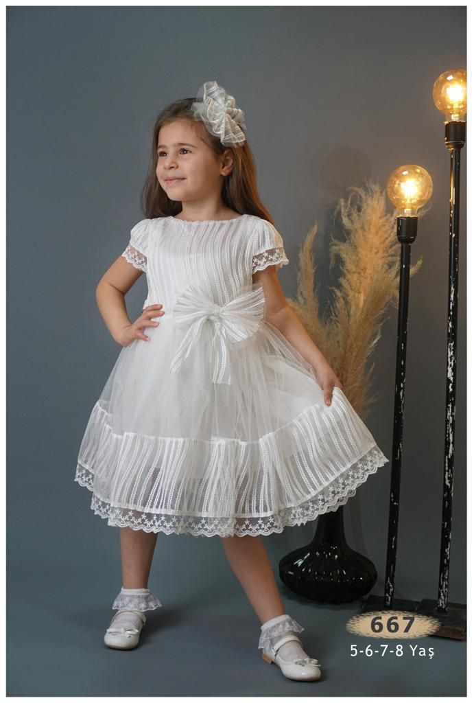 BEYAZ KABARIK TÜLLÜ ELBİSE